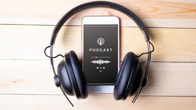 a podcast audiogram on phone with a headphone on a table